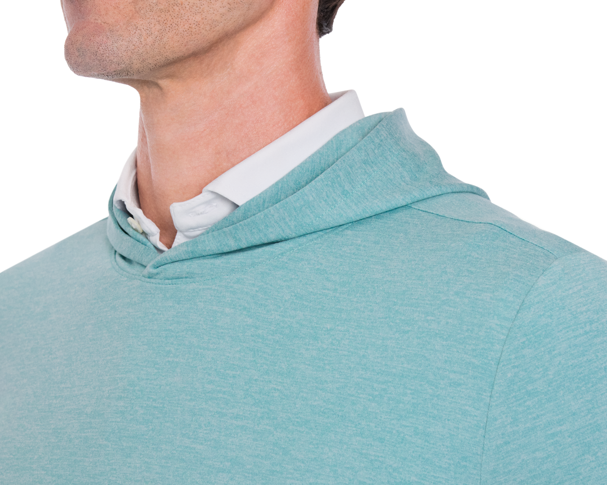 The Stowe Hoodie: Heathered Harbor, shown layered with a white shirt, features a soft, lightweight fabric, set-in sleeves, and an athletic drop-tail hem.
