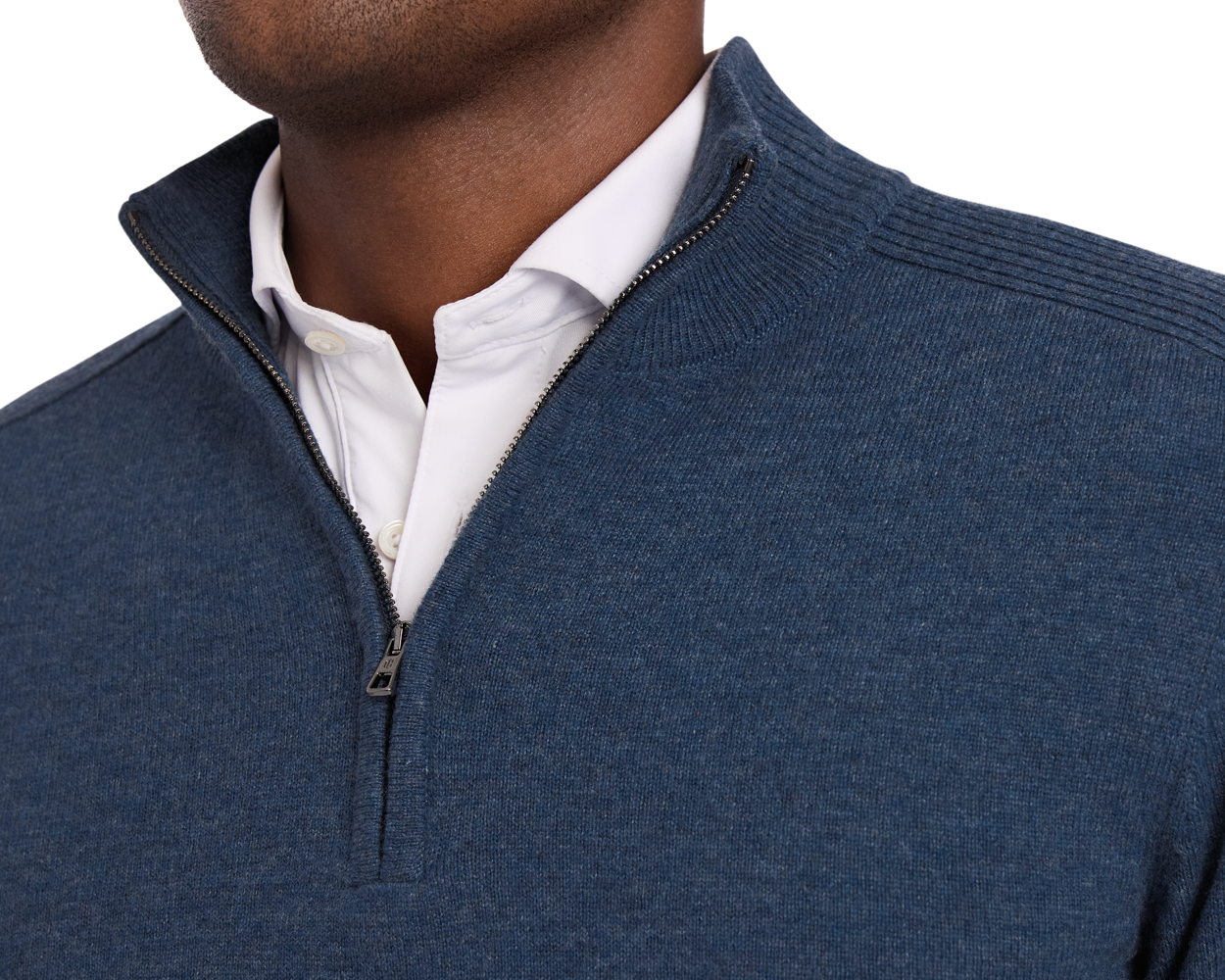 Close-up of a person wearing a Holderness & Bourne Men’s Blue Quarter Zip Sweater over a white shirt on a white background
