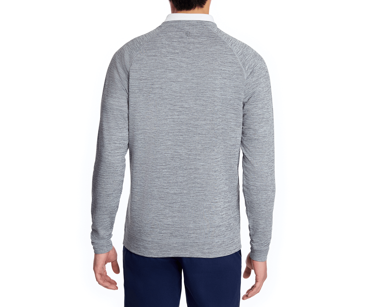The Laidlay Crewneck: Heathered Gray, shown from the back, highlights its soft, stretchy fabric and modern fit, worn with navy pants against a simple backdrop.
