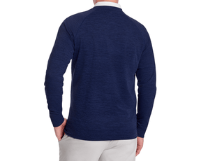 The Laidlay Crewneck: Heathered Navy, shown from the back, features a white polo collar, heathered texture, and is paired with light-beige trousers.