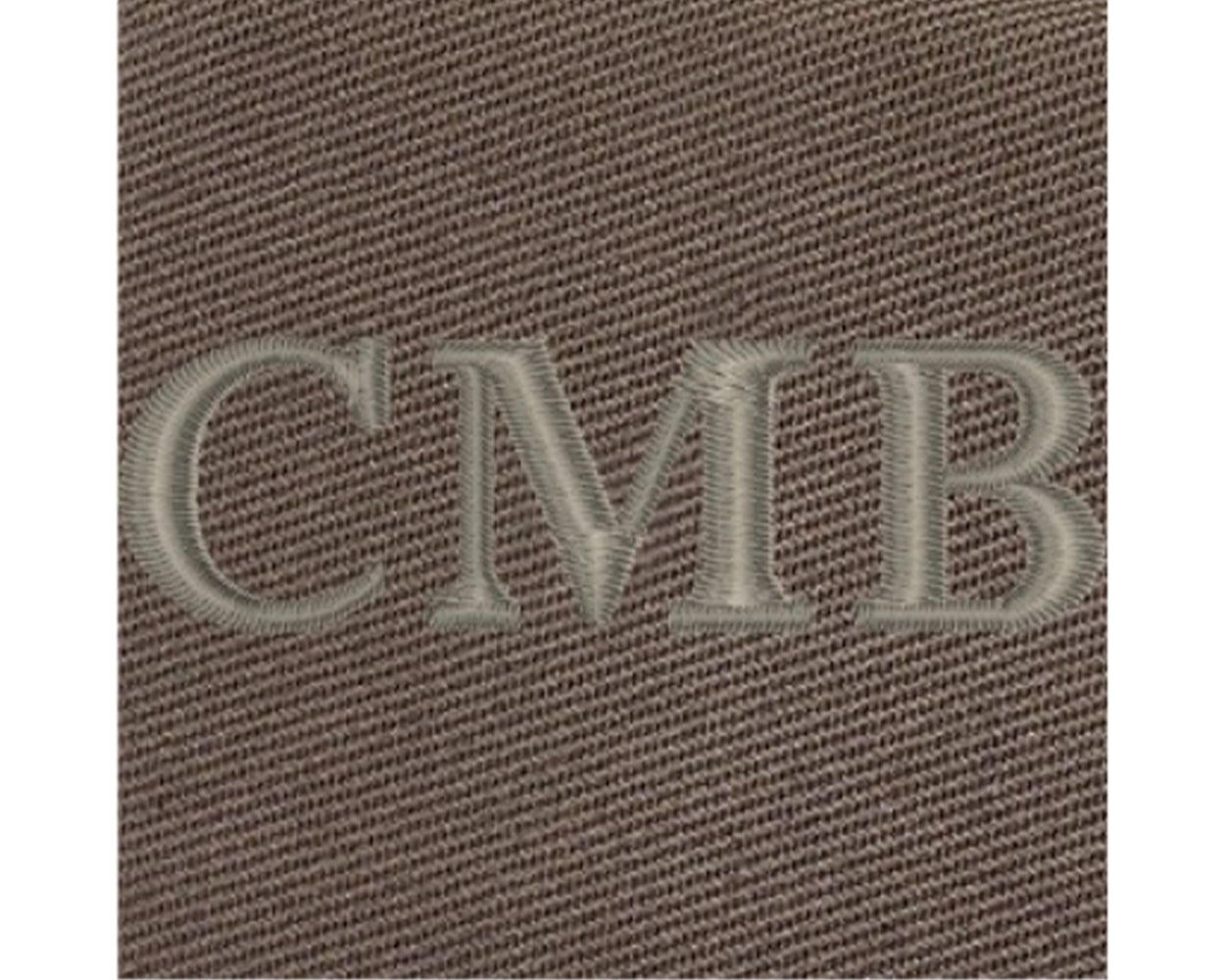 Close-up of The Travis Tote Bag Cotton Twill: Scotch Green, showcasing CMB embroidery on durable, tightly woven fabric, highlighting personalization detail.