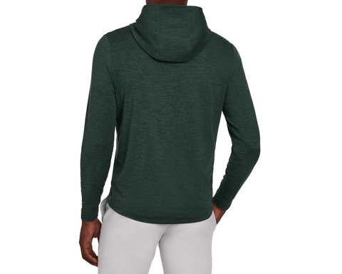Back view of a male model wearing The Stowe Hoodie: Heathered Cypress, showing the hood, plain back, and curved drop-tail hem with light gray pants.