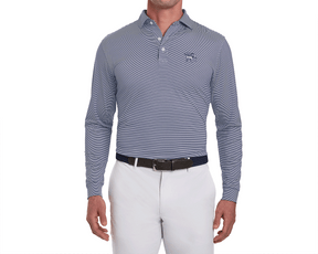 Man wearing Yale Golf Course Burke Shirt: Navy & White, featuring fine stripes, embroidered bulldog logo, tucked into white trousers with dual belts.